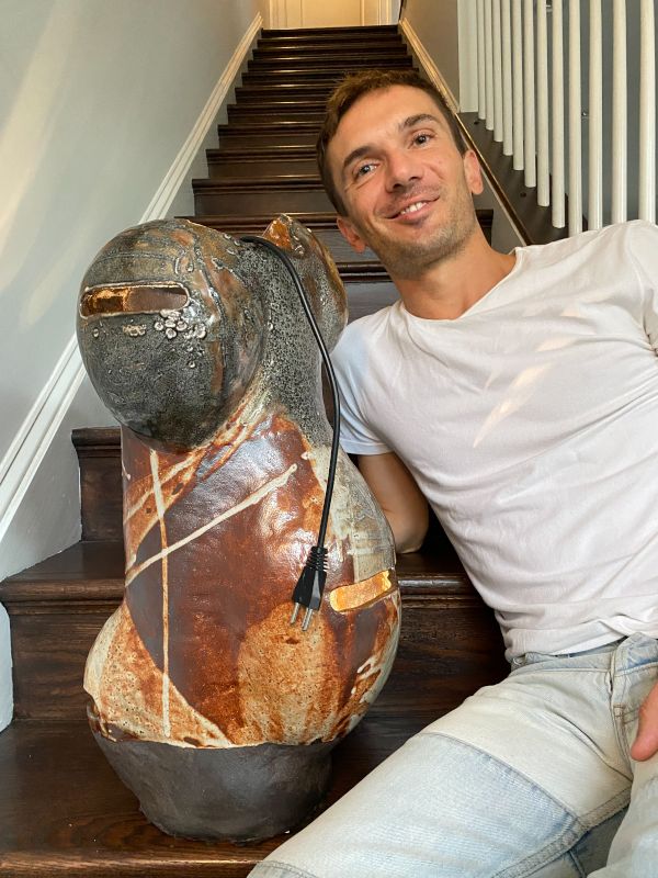 Luigi With a Clay Lamp He Made