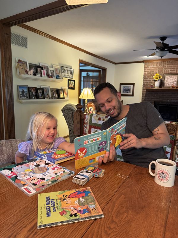 Diego Reading With Our Niece