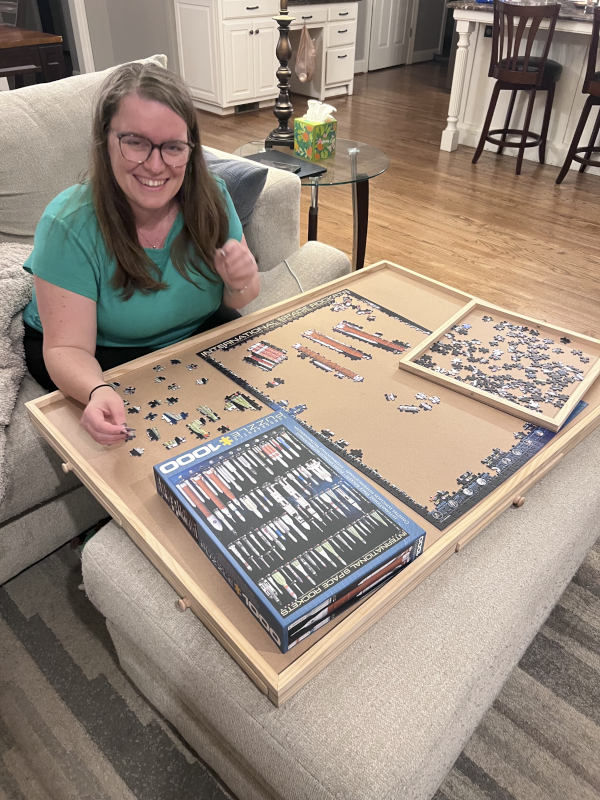 Kerri Putting Together a Puzzle from a Local Museum