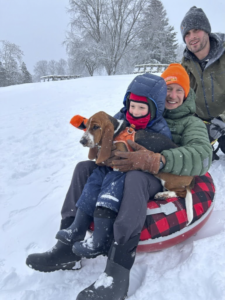 Caddy Sledding With Brother-in-Law Jeff, Nephew Archie, and Dog Bug